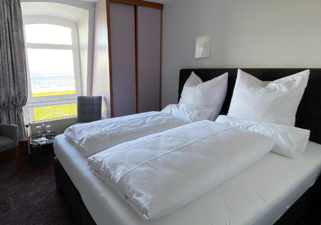 Postel nebo postele na pokoji v ubytování Strandvilla an der Kaiserwiese