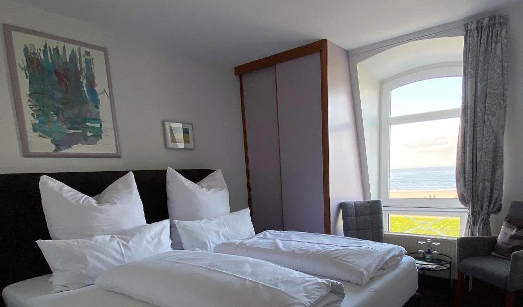 Postel nebo postele na pokoji v ubytování Strandvilla an der Kaiserwiese