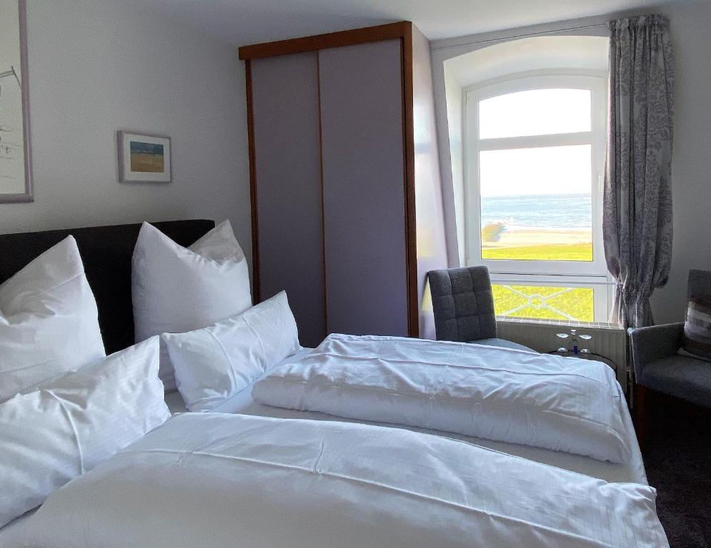 Postel nebo postele na pokoji v ubytování Strandvilla an der Kaiserwiese