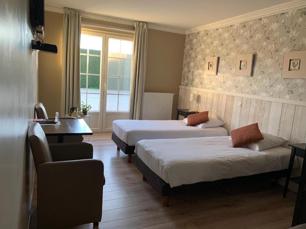 Voodi või voodid majutusasutuse B&B Castellier toas