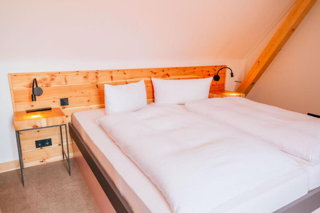 Postel nebo postele na pokoji v ubytování Hotel Andres