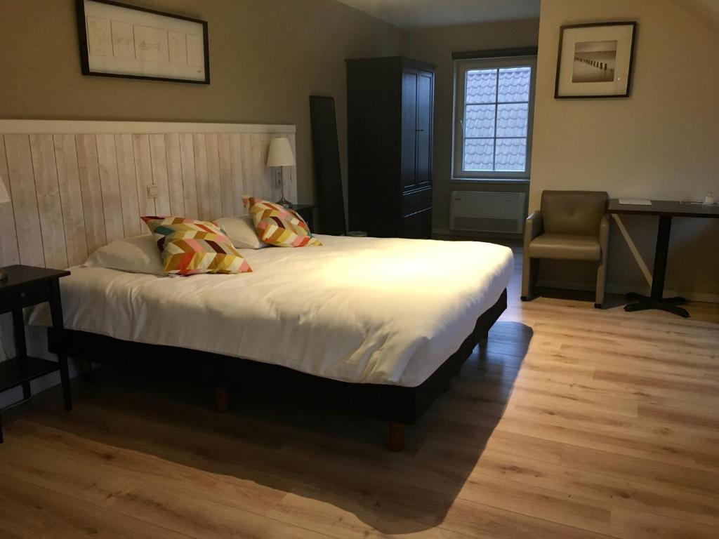 Voodi või voodid majutusasutuse B&B Castellier toas