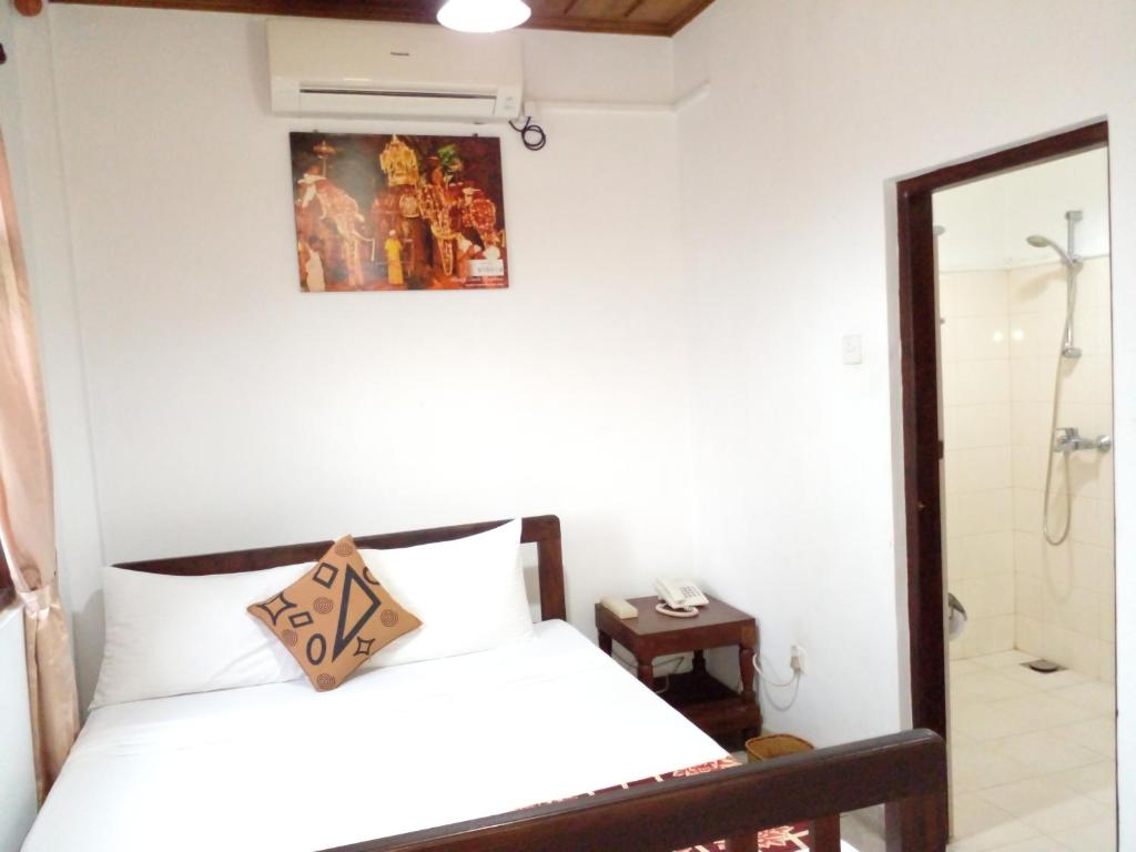 Postel nebo postele na pokoji v ubytování Muduna Walawwa Resort