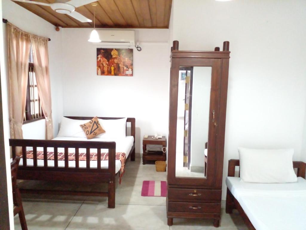 Postel nebo postele na pokoji v ubytování Muduna Walawwa Resort