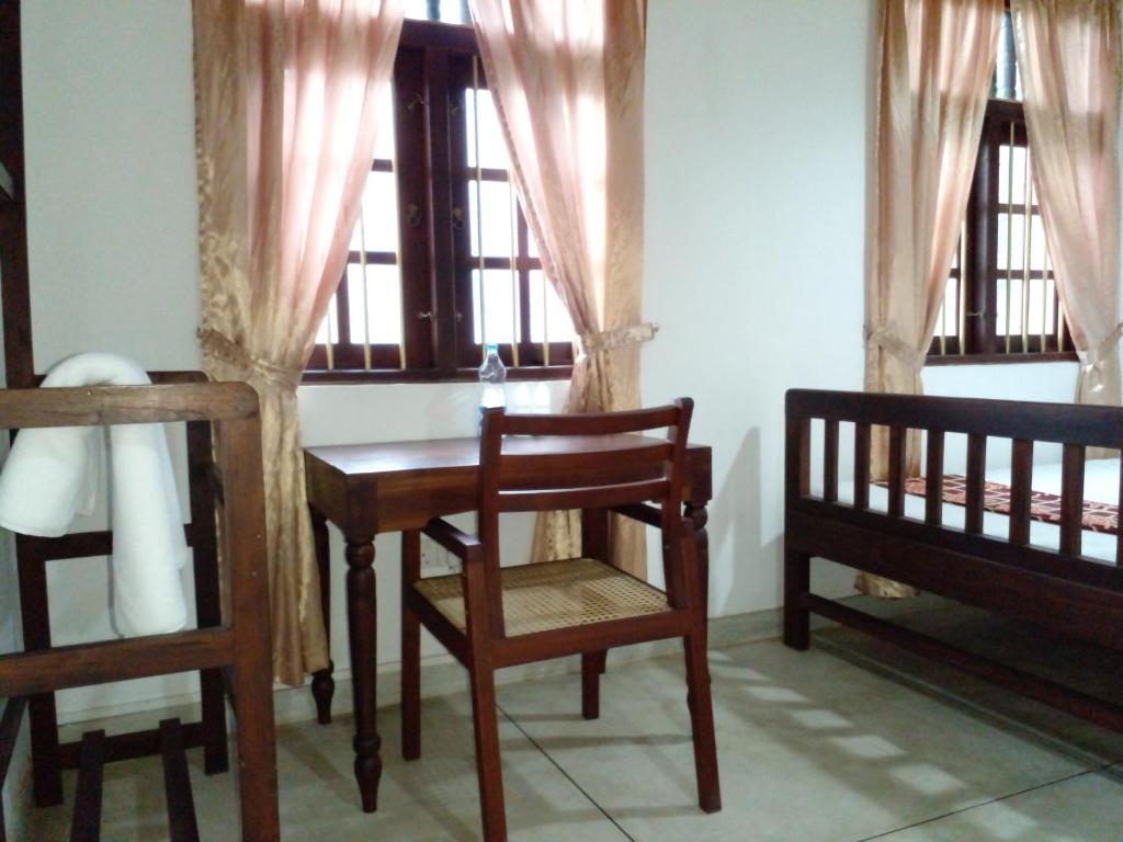 Postel nebo postele na pokoji v ubytování Muduna Walawwa Resort