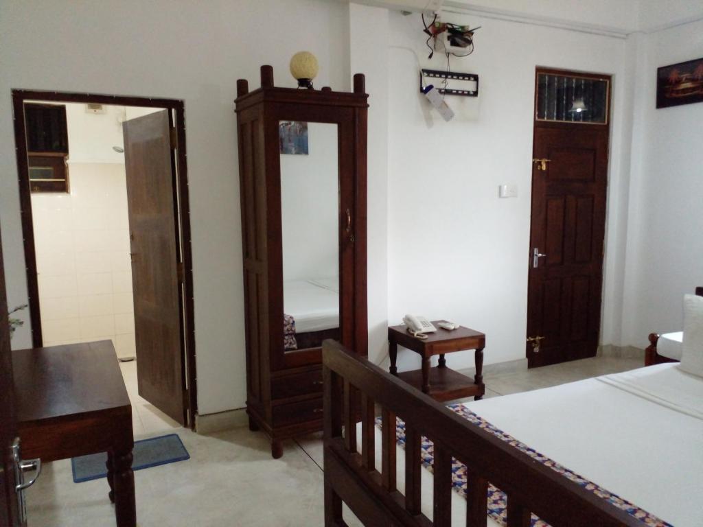 Postel nebo postele na pokoji v ubytování Muduna Walawwa Resort