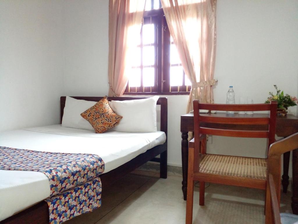 Postel nebo postele na pokoji v ubytování Muduna Walawwa Resort