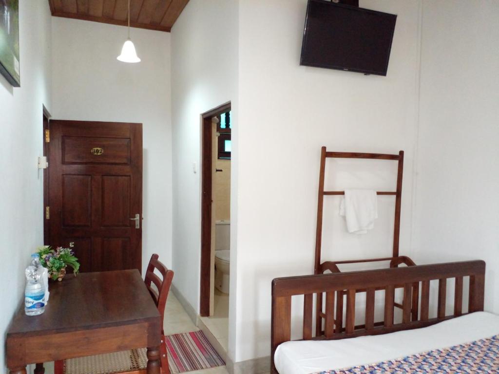 Postel nebo postele na pokoji v ubytování Muduna Walawwa Resort