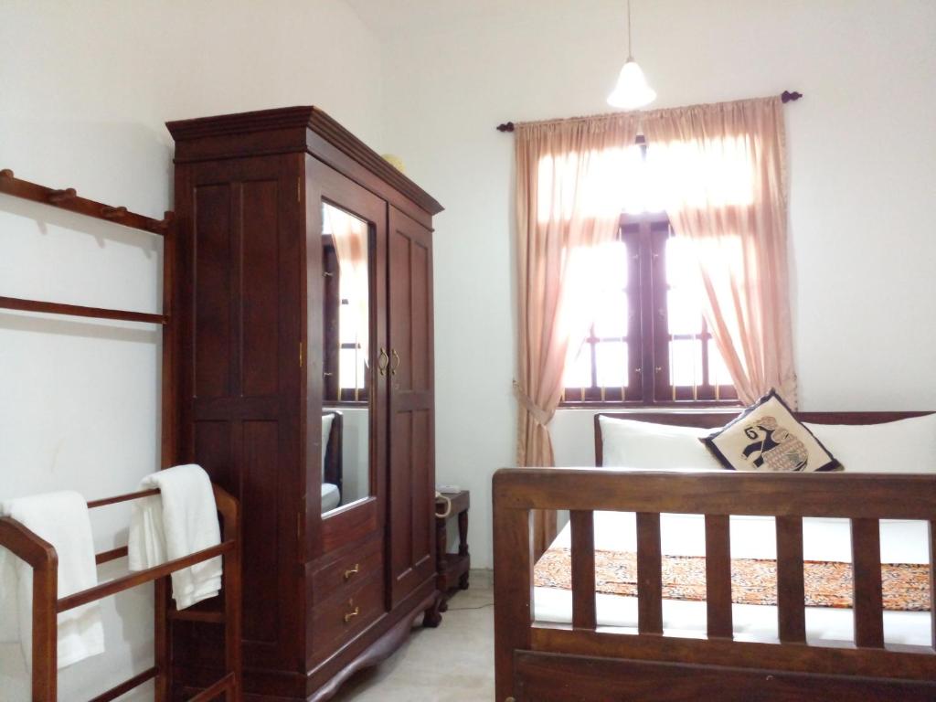 Postel nebo postele na pokoji v ubytování Muduna Walawwa Resort