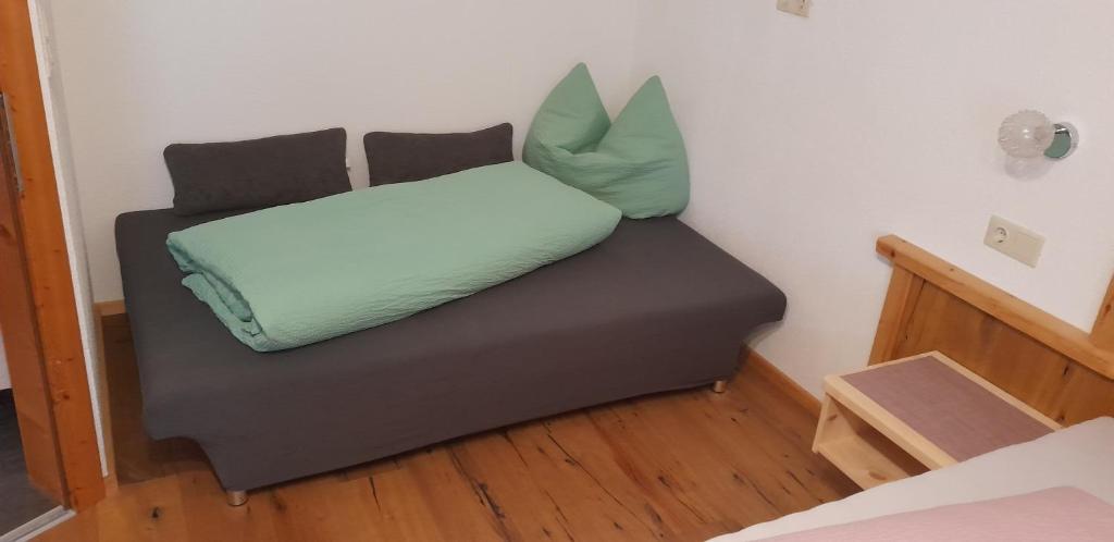 Letto o letti in una camera di Haus Rottensteiner
