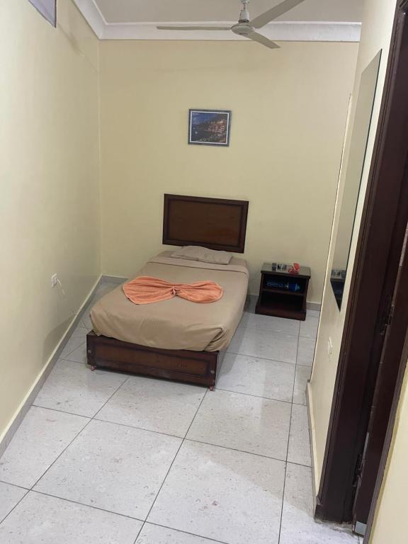 Postel nebo postele na pokoji v ubytování Makkah Hotel