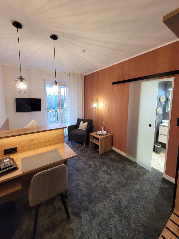 TV a/nebo společenská místnost v ubytování Hotel Pieper-Kersten