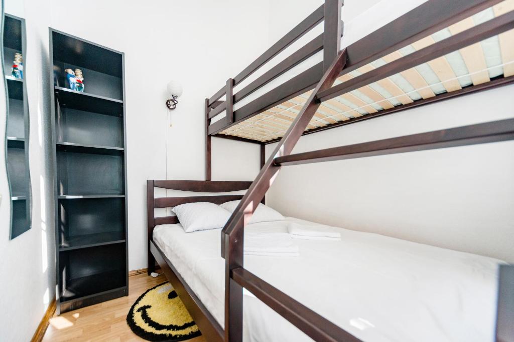 Postel nebo postele na pokoji v ubytování Muzey Hostel