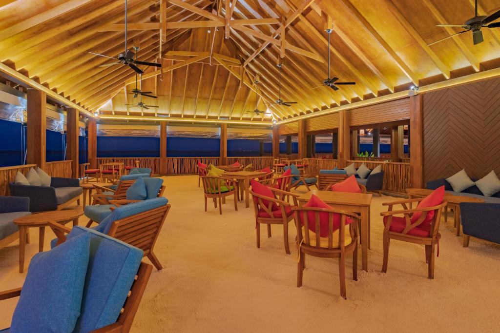 Zona de estar de Dhigufaru Island Resort