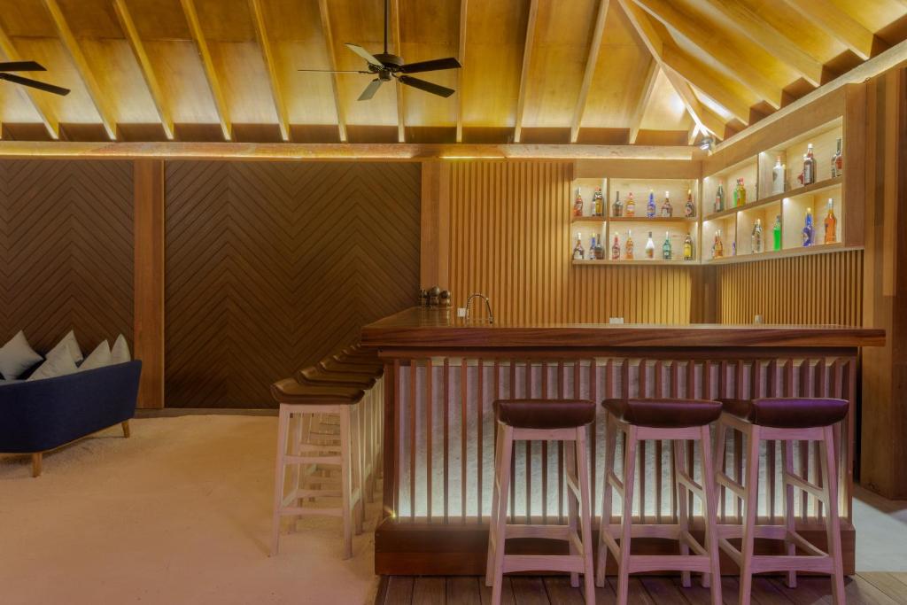 Zona de estar de Dhigufaru Island Resort