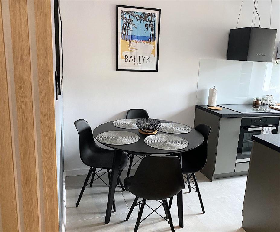 Kuchyňa alebo kuchynka v ubytovaní Apartamenty Marea Rentals Bałtyk Ustka