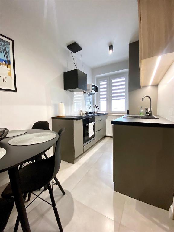 Kuchyňa alebo kuchynka v ubytovaní Apartamenty Marea Rentals Bałtyk Ustka