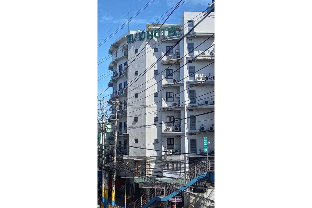 an image of a building with fire escapes at Capital O 1010 Hotel in Manila