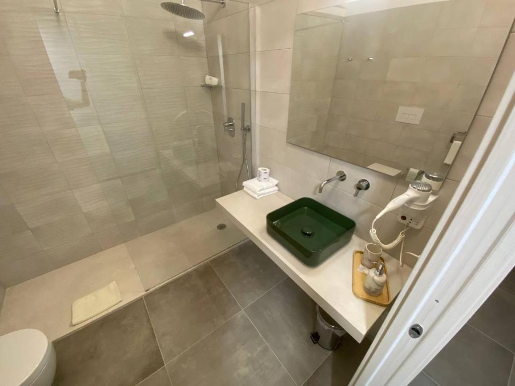 Koupelna v ubytování Hotel Ispinigoli