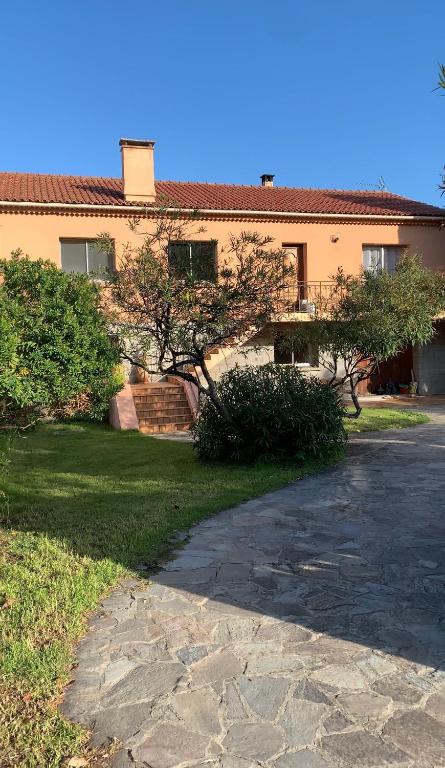 Vonkajšia záhrada v ubytovaní Casa Rossa Solenzara