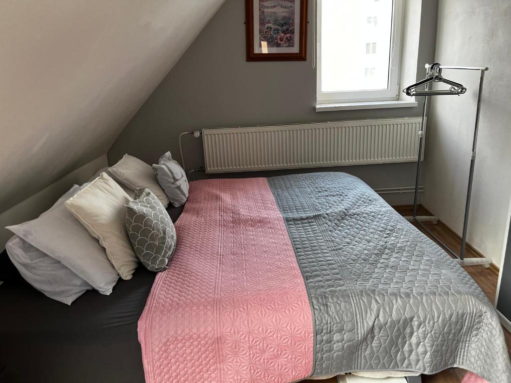 Postel nebo postele na pokoji v ubytování Penzion Pomodoro