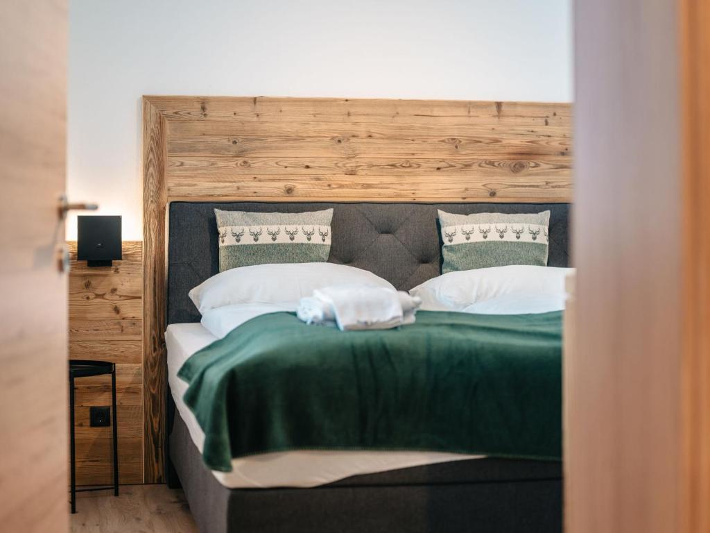 Posteľ alebo postele v izbe v ubytovaní Chalet Mountain Lodge - Klippitztörl by Interhome