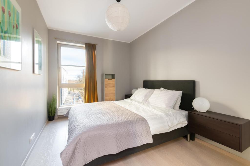 Postel nebo postele na pokoji v ubytování Free Parking, Quiet, One-bedroom at Kalamaja apartment
