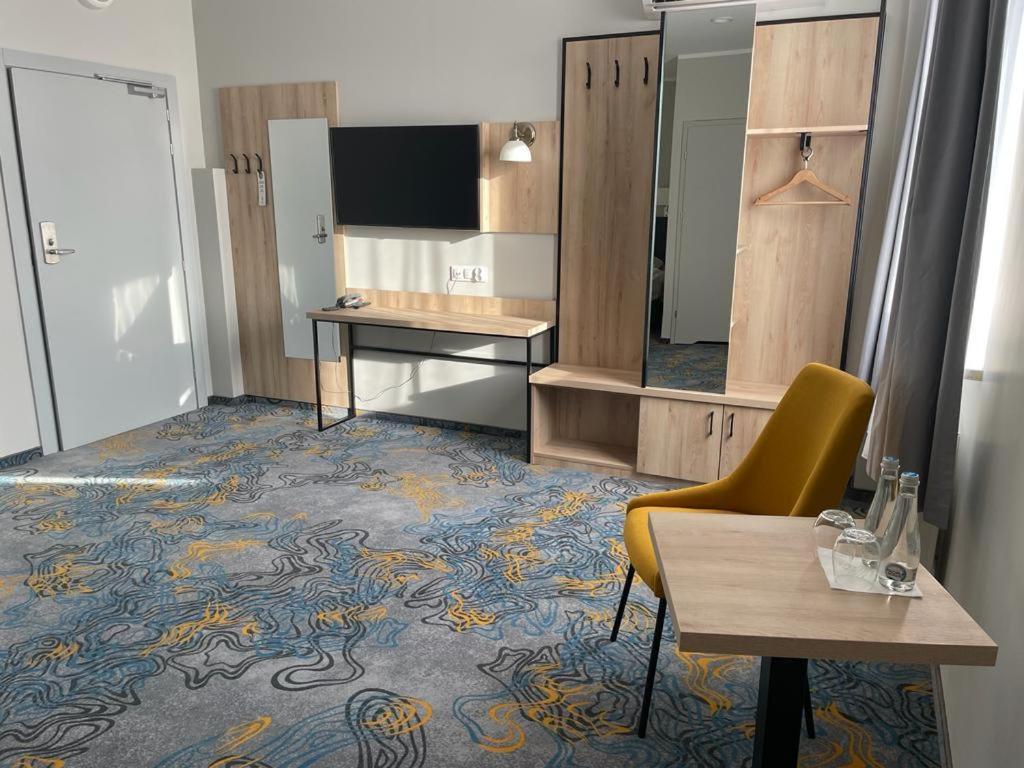 TV a/nebo společenská místnost v ubytování Hotel Dobosz