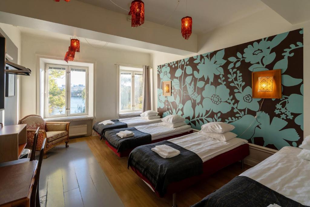 Postel nebo postele na pokoji v ubytování Reimersholme Hotel