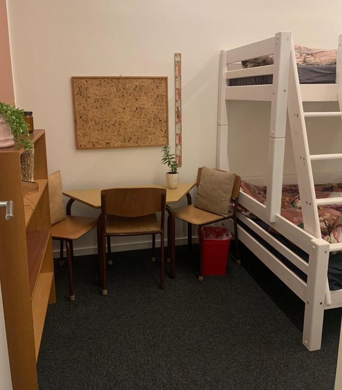 Postel nebo postele na pokoji v ubytování Børnenes