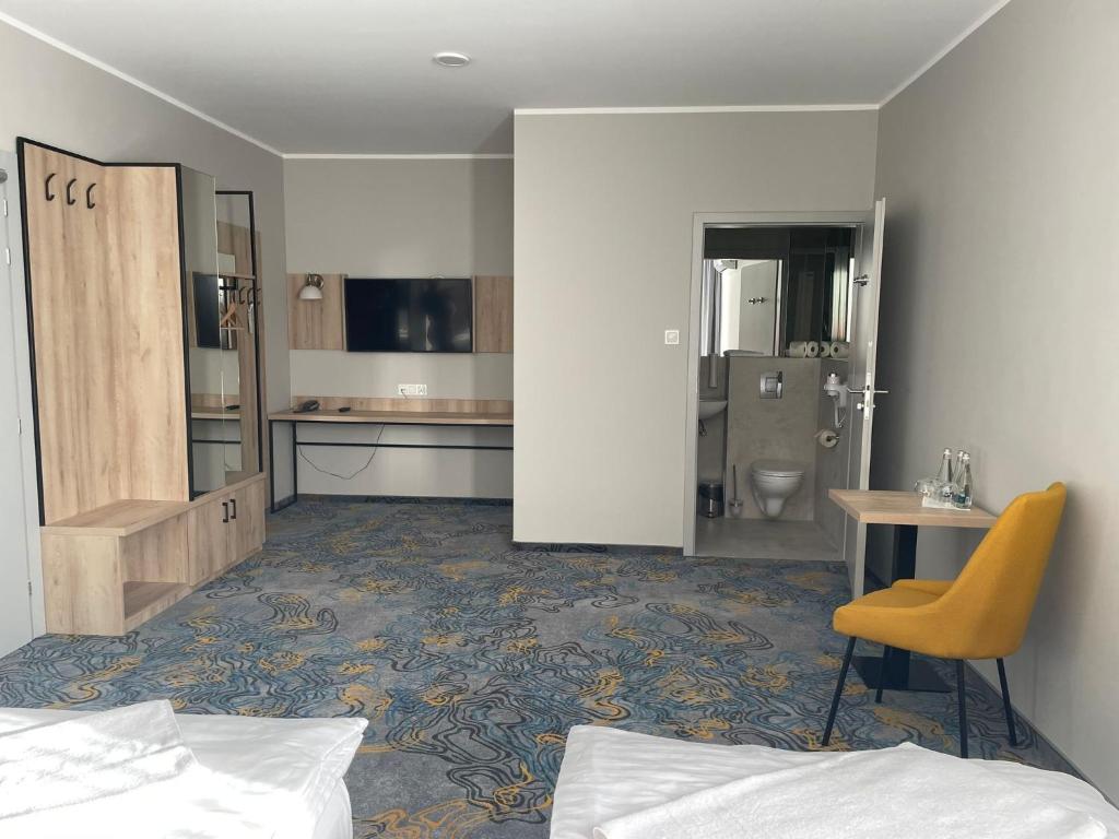 TV a/nebo společenská místnost v ubytování Hotel Dobosz
