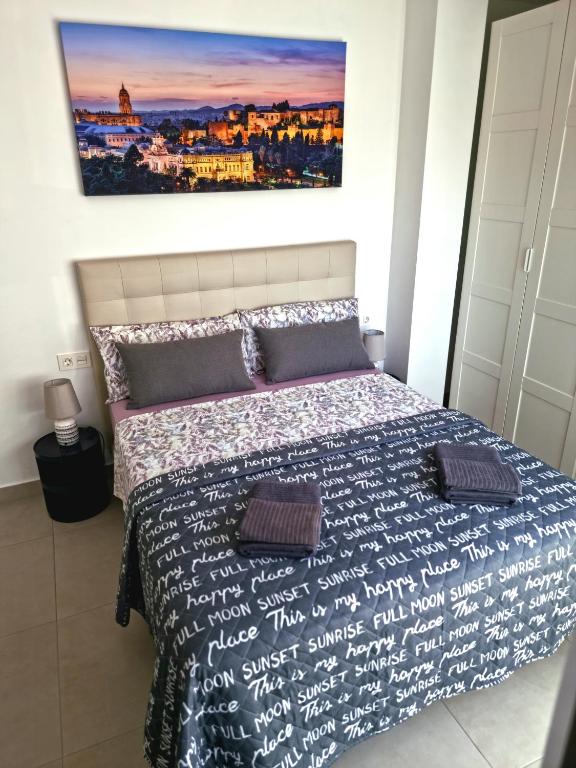 Postel nebo postele na pokoji v ubytování APARTAMENTOS ELEMAR free luggage storage