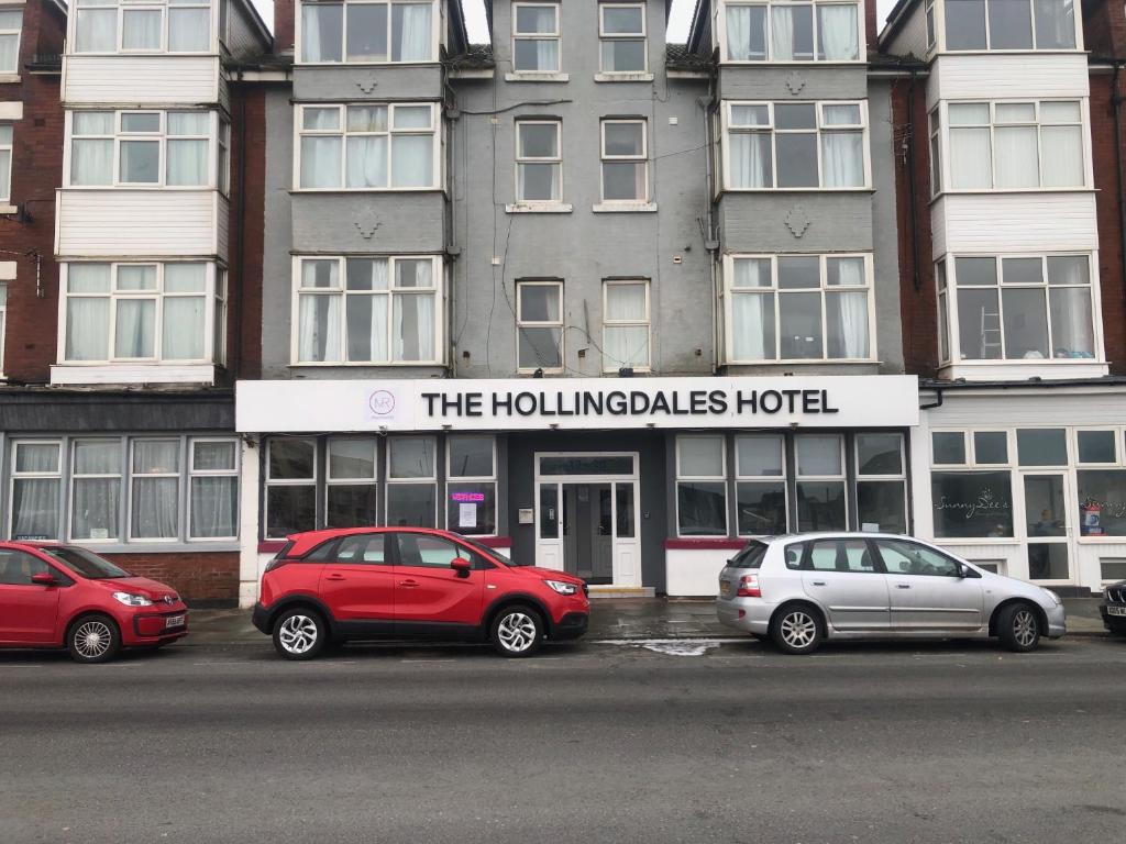 a group of cars parked in front of a hotel at MyRoomz Hollingdales Hotel in Blackpool