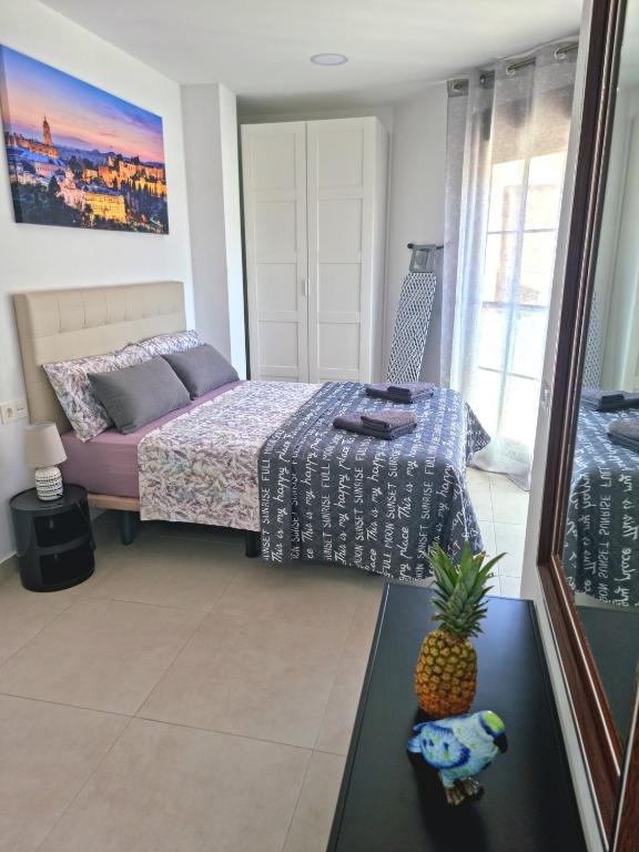 Postel nebo postele na pokoji v ubytování APARTAMENTOS ELEMAR free luggage storage