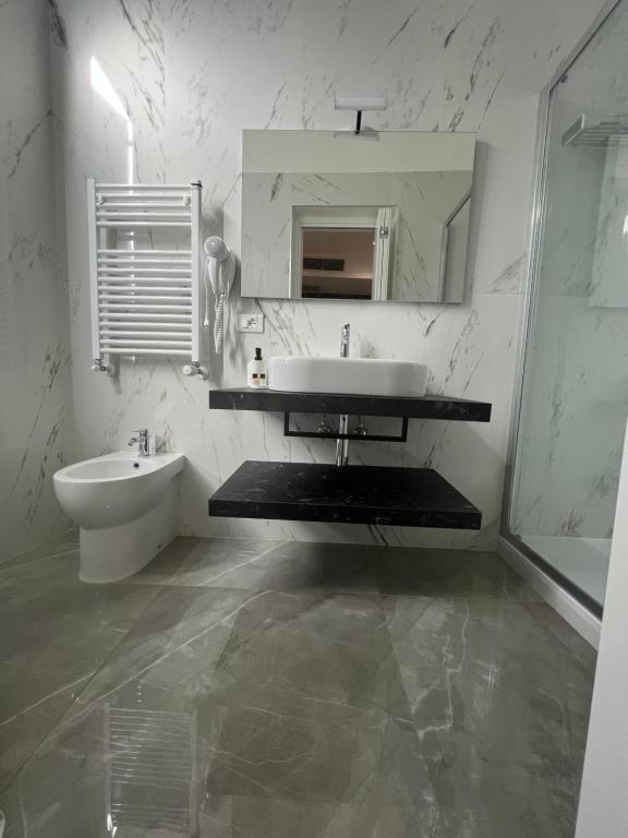 Koupelna v ubytování Hotel Porto Di Roma