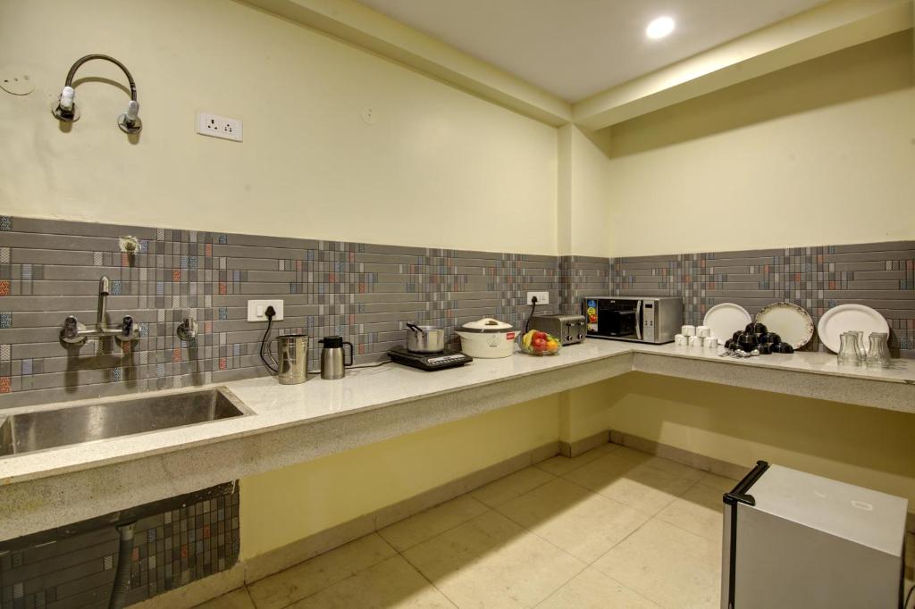 Kuchyň nebo kuchyňský kout v ubytování Hotel TMS Grand
