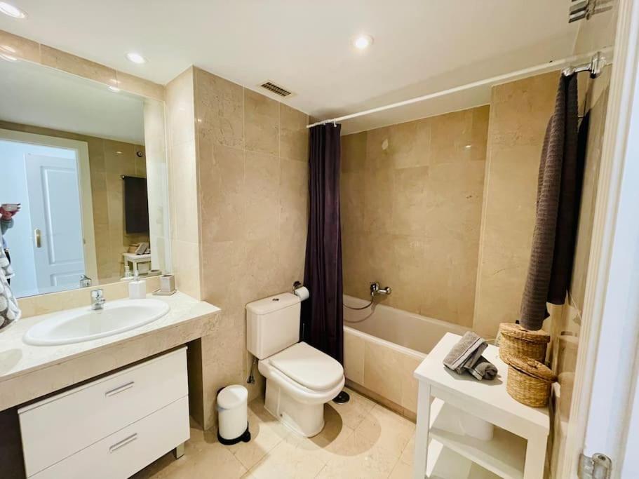 A bathroom at Walking distance to Puerto Banus sea view Apartment