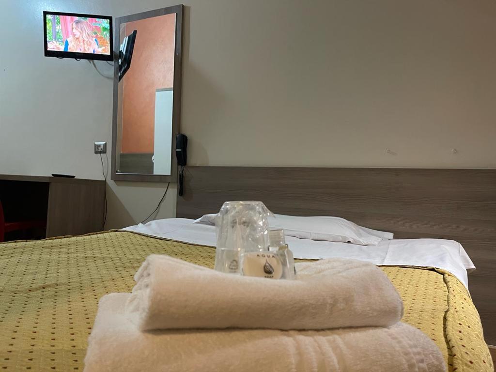 Postel nebo postele na pokoji v ubytování Hotel 26