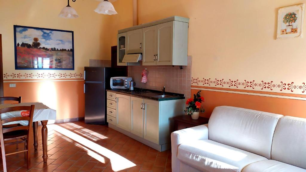 Kuchyň nebo kuchyňský kout v ubytování agriturismo macchia al pino