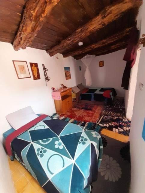 Postel nebo postele na pokoji v ubytování Ranch de Sidi kaouki
