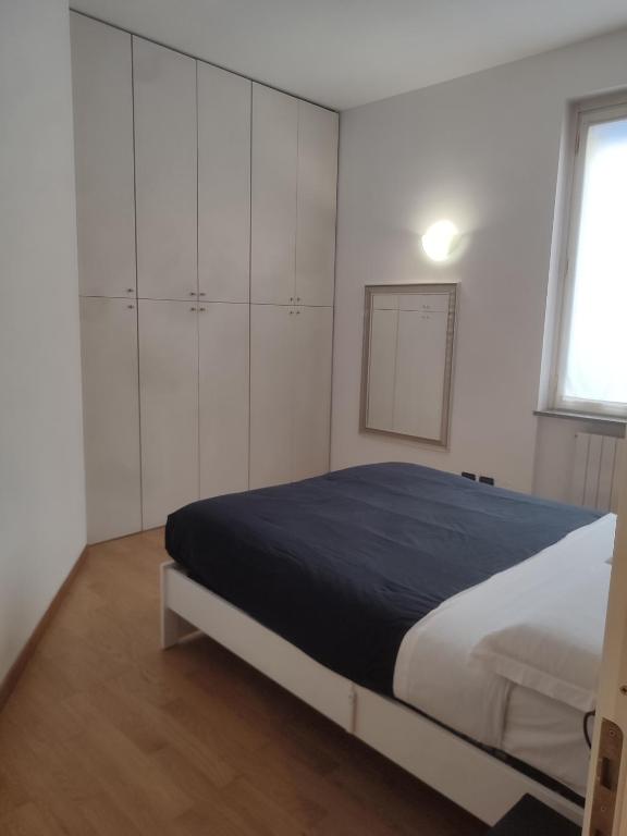 A bed or beds in a room at Brera