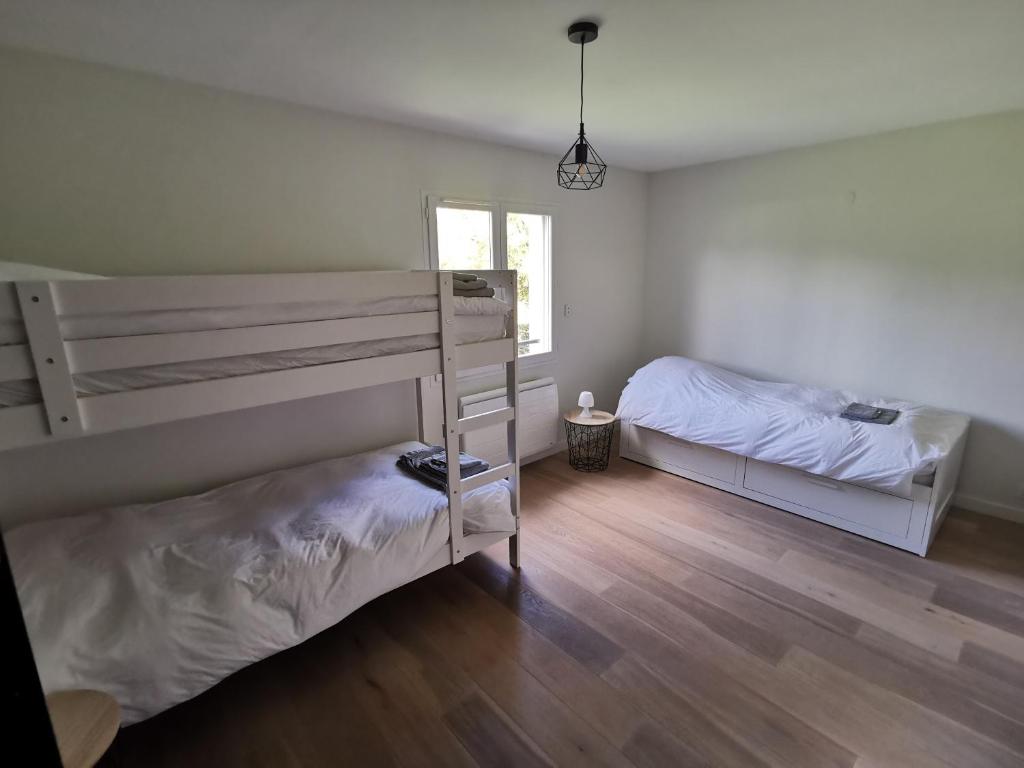 Posteľ alebo postele v izbe v ubytovaní Villa 8 personnes à proximité des bords de Saône