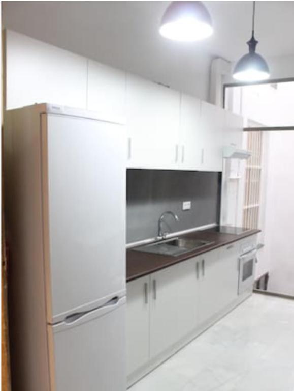 Kuchnia lub aneks kuchenny w obiekcie Amazing Sevilla Apartamento