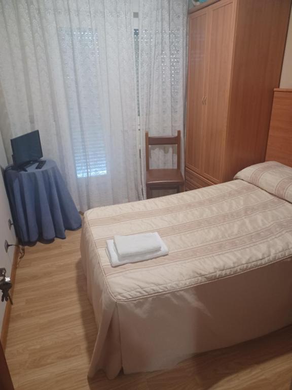 Łóżko lub łóżka w pokoju w obiekcie Hotel 2 de mayo 2