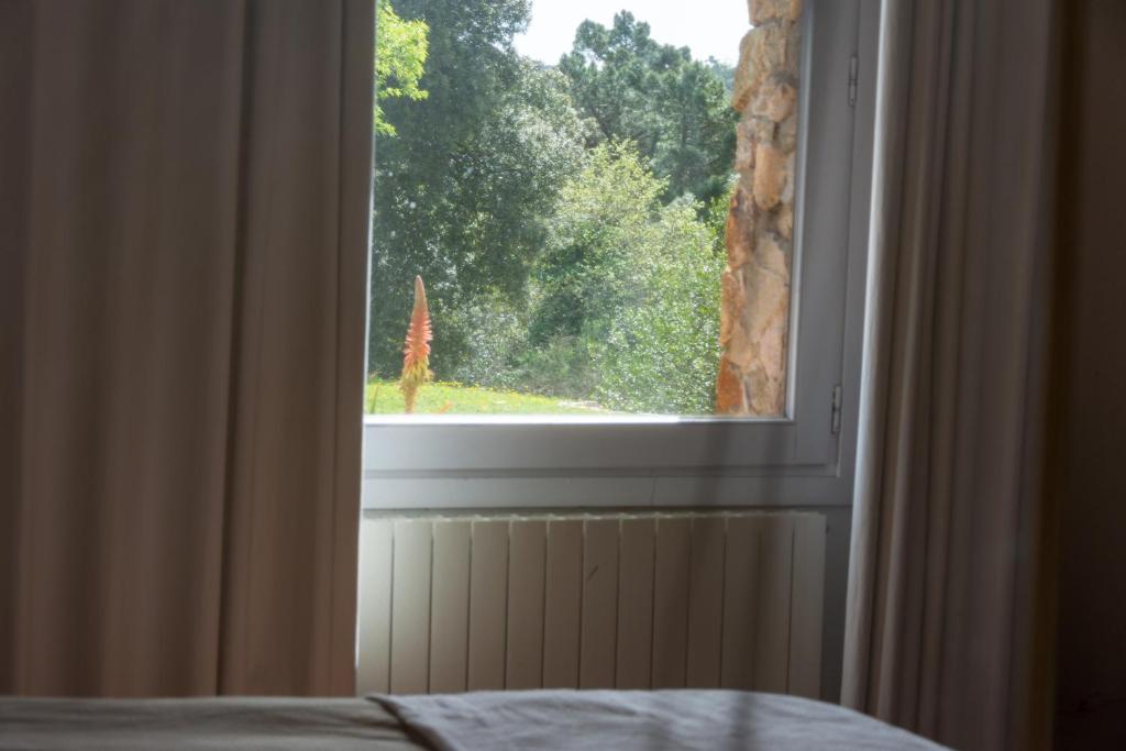 Postel nebo postele na pokoji v ubytování Can Negrell