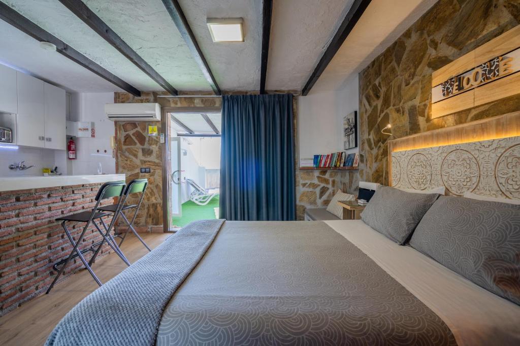 Postel nebo postele na pokoji v ubytování Sunny Studio Nerja