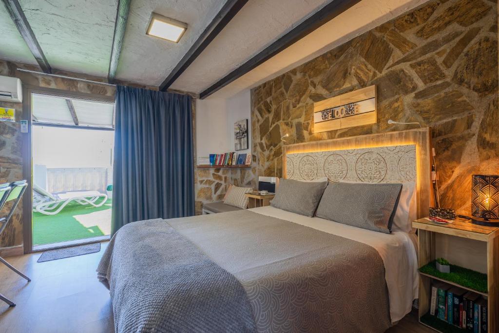 Postel nebo postele na pokoji v ubytování Sunny Studio Nerja
