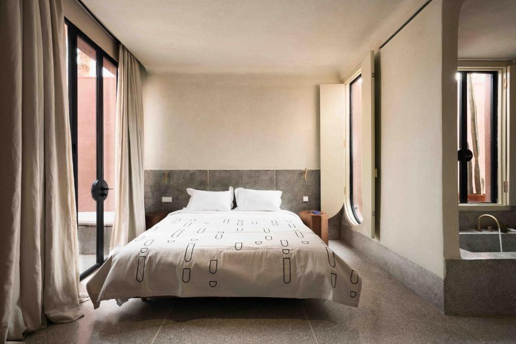 Postel nebo postele na pokoji v ubytování Maison Brummell Majorelle