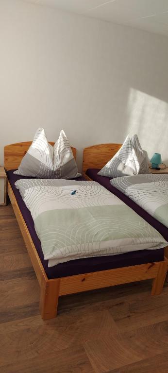 Postel nebo postele na pokoji v ubytování Ferienhaus und Ferienappartements Brunner