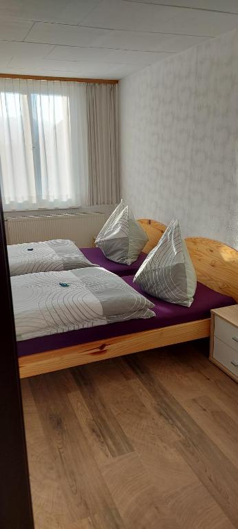 Postel nebo postele na pokoji v ubytování Ferienhaus und Ferienappartements Brunner